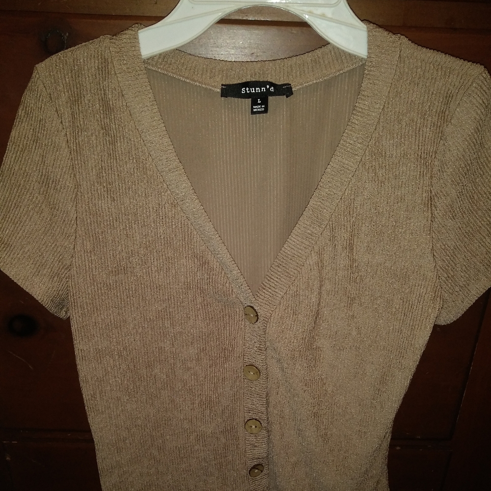 This blouse is by stunn'd its size large